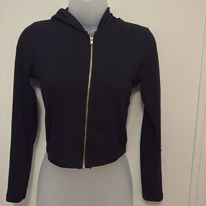 Black jacket with gold zipper